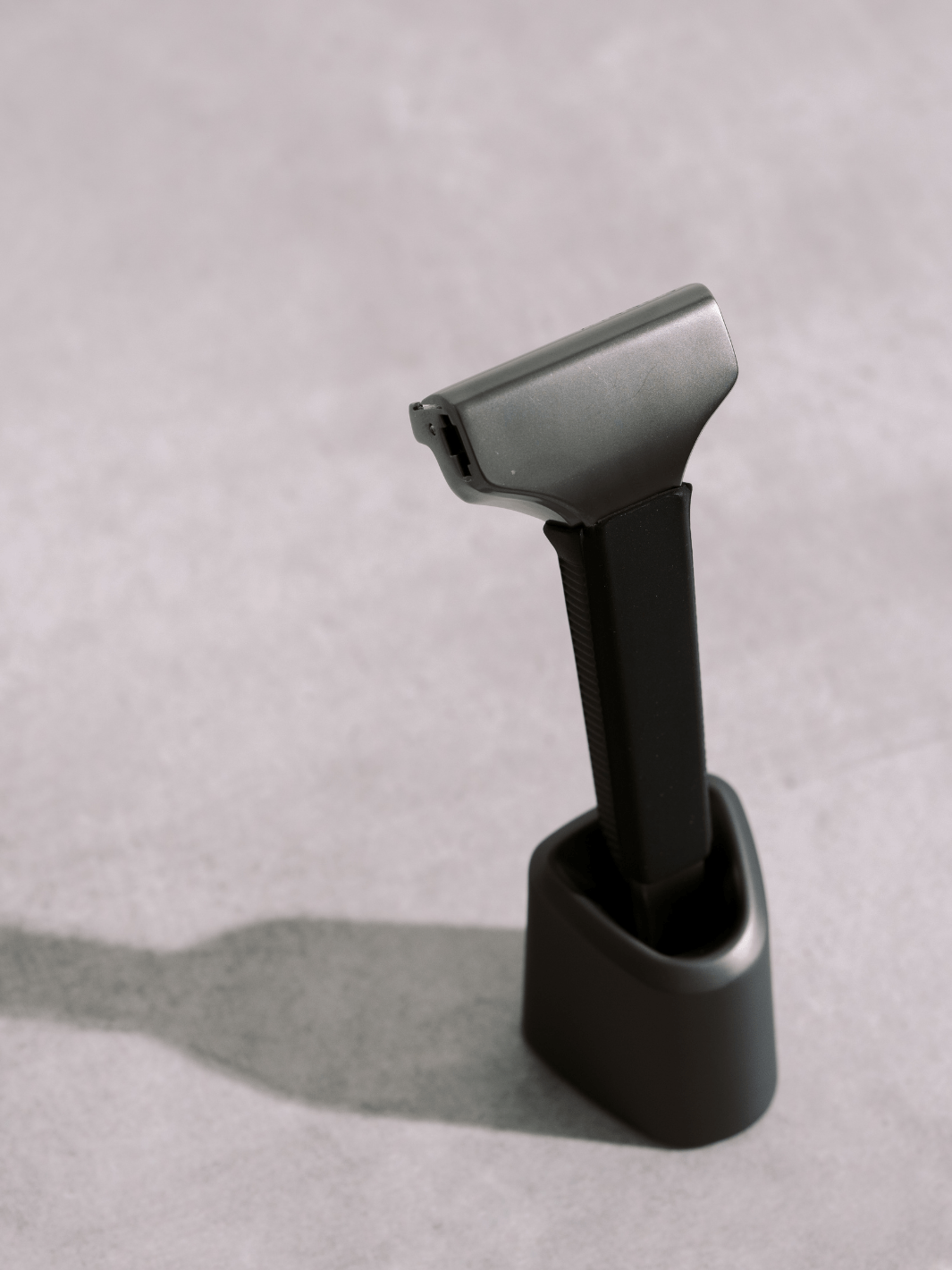 Grip Sleeve - Accessories - black sleeve in razor stand