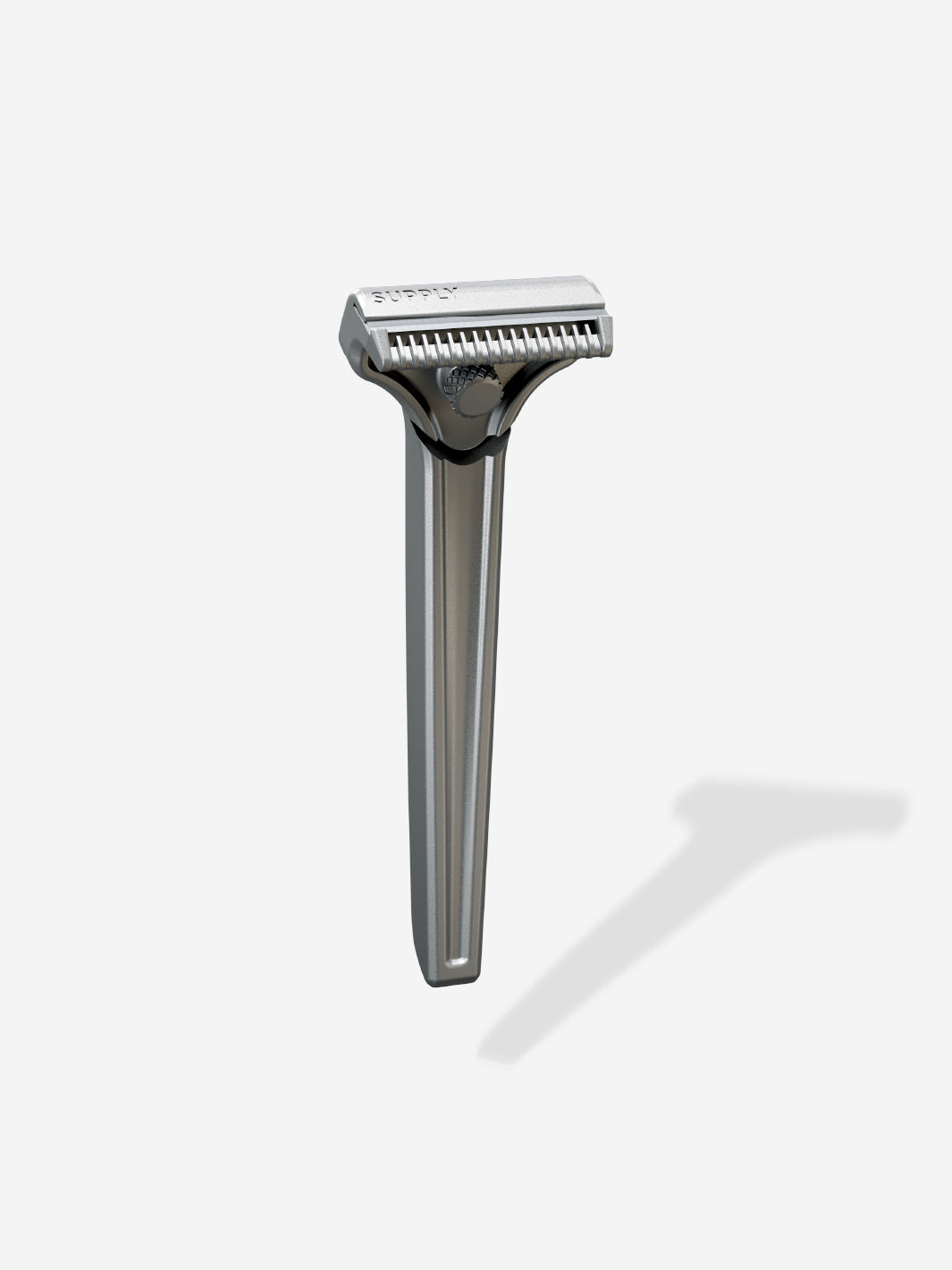 Silver safety razor with a sleek design on a light background.