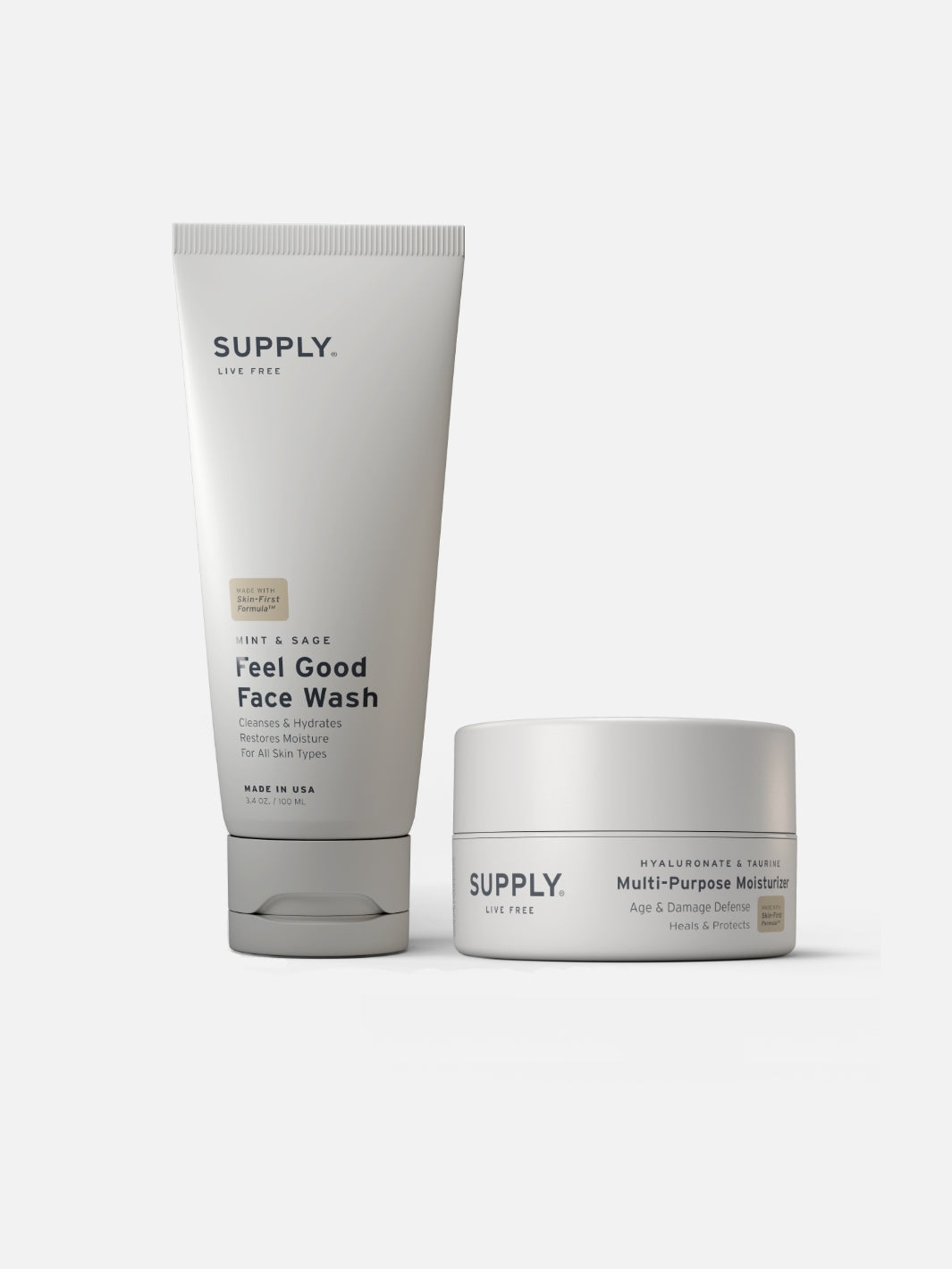 Supply face wash and moisturizer on a plain background.