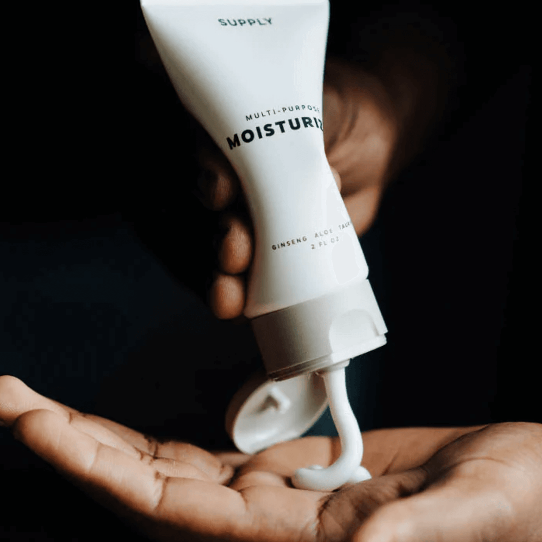 pouring moisturizer on the palm