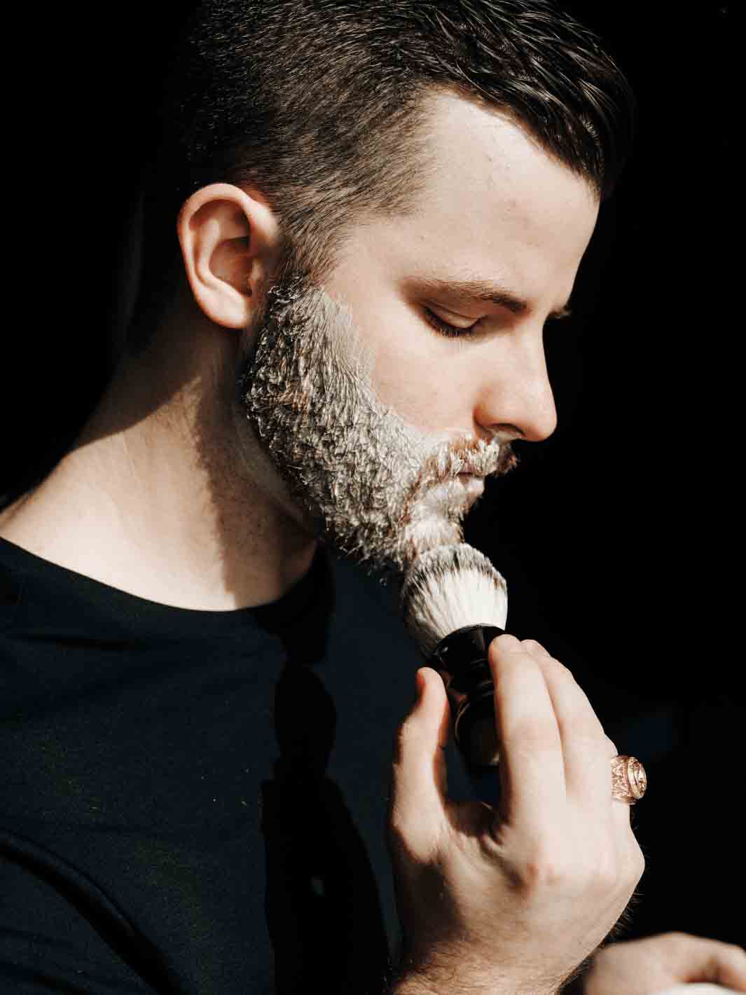 Man using the Supply silvertip synthetic shaving brush